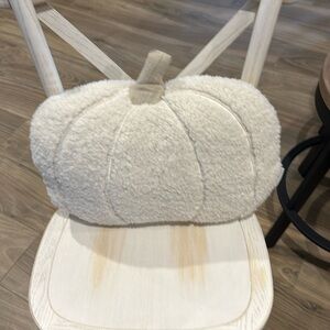 White pumpkin shaped pillow